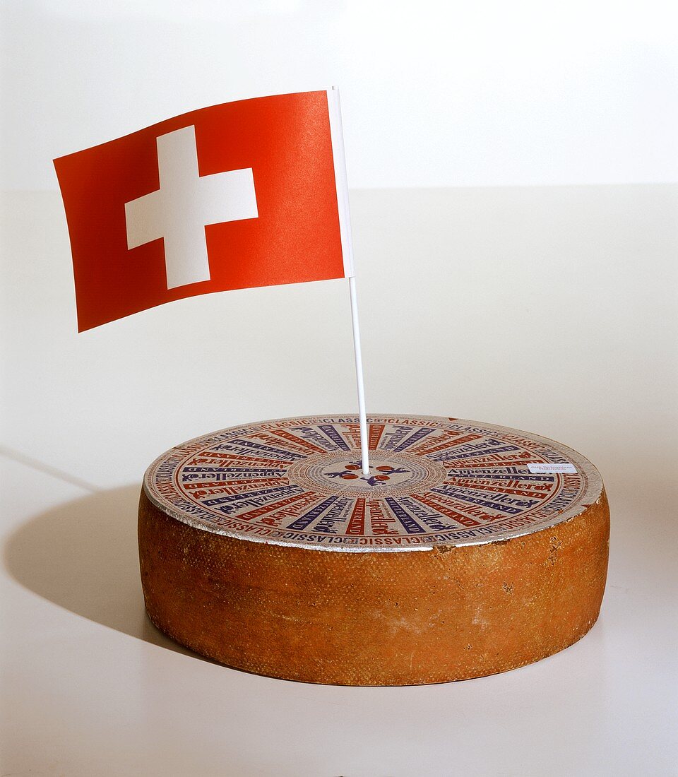 A Wheel of Appenzeller with Swiss Flag