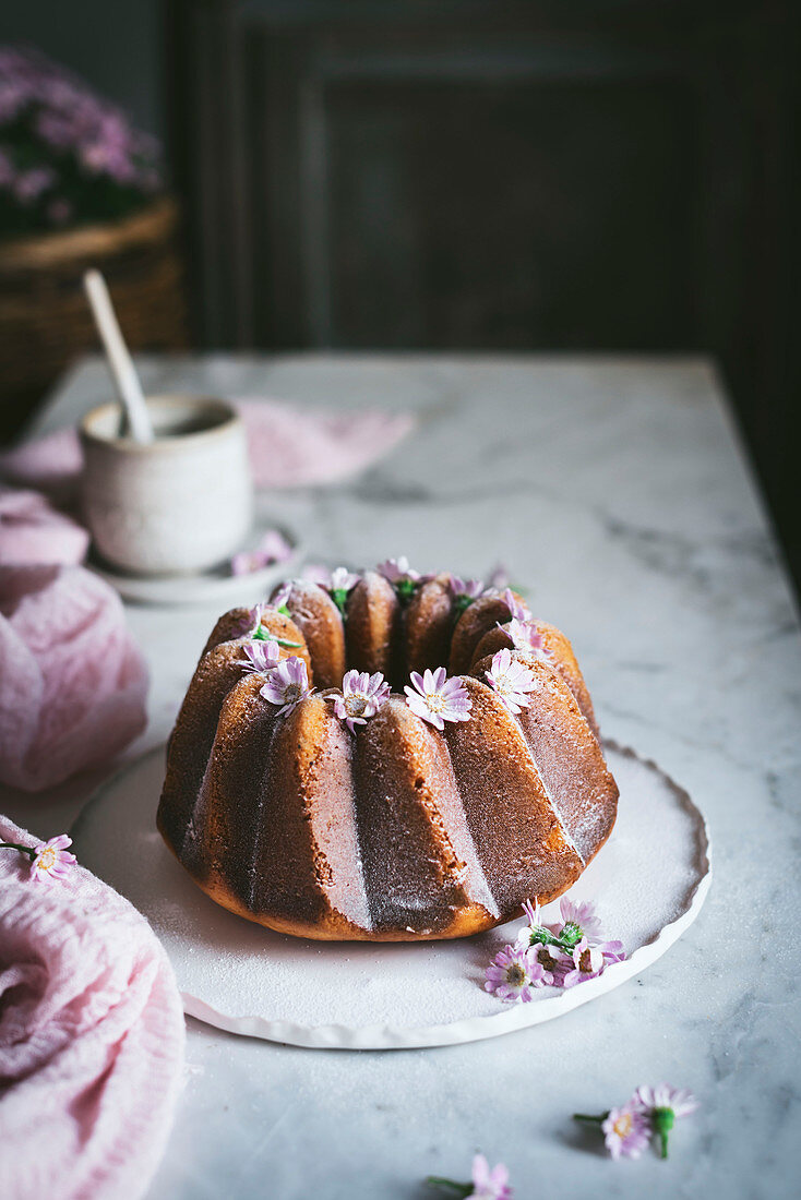Bundt cake decorated with fresh flowers