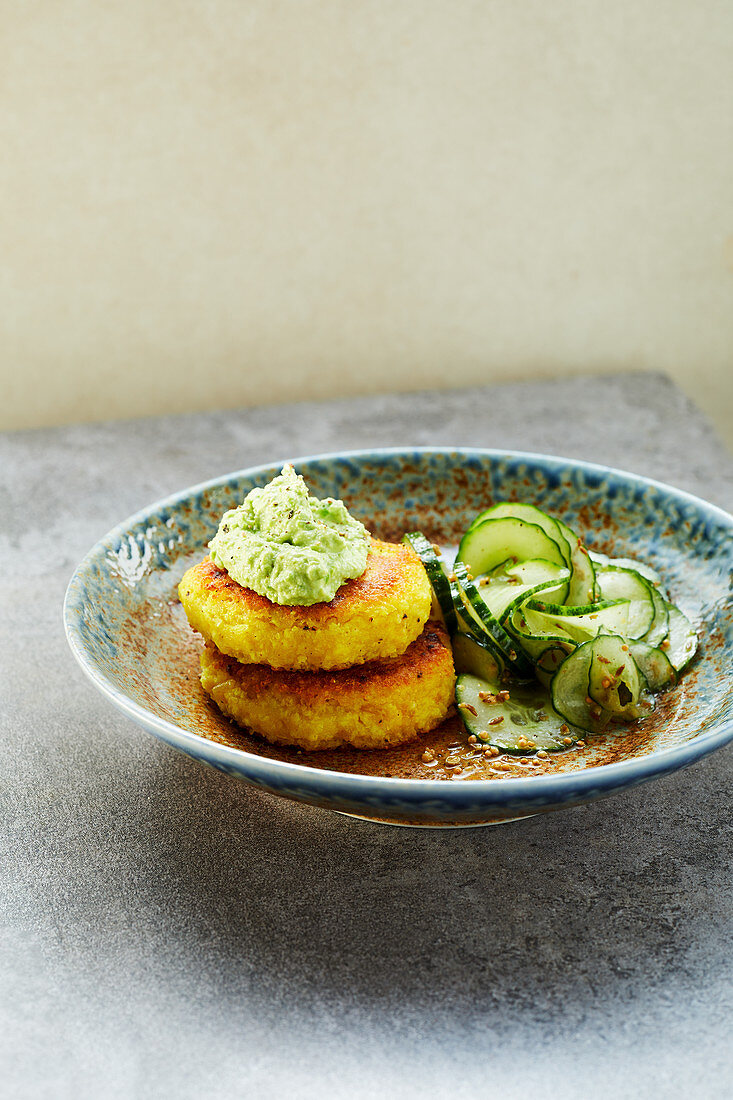 potato and millet fritters with pea dip and a cucumber salad