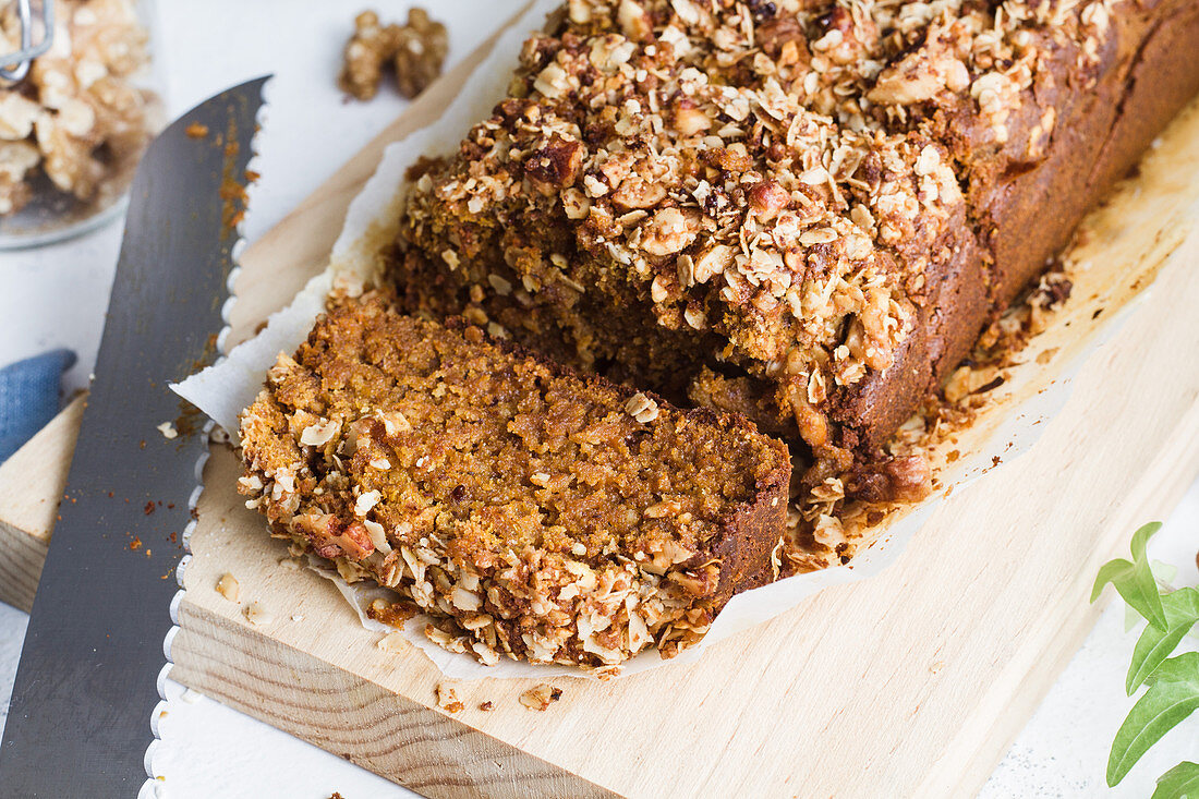 Pumpkin bread on wooden chopping board