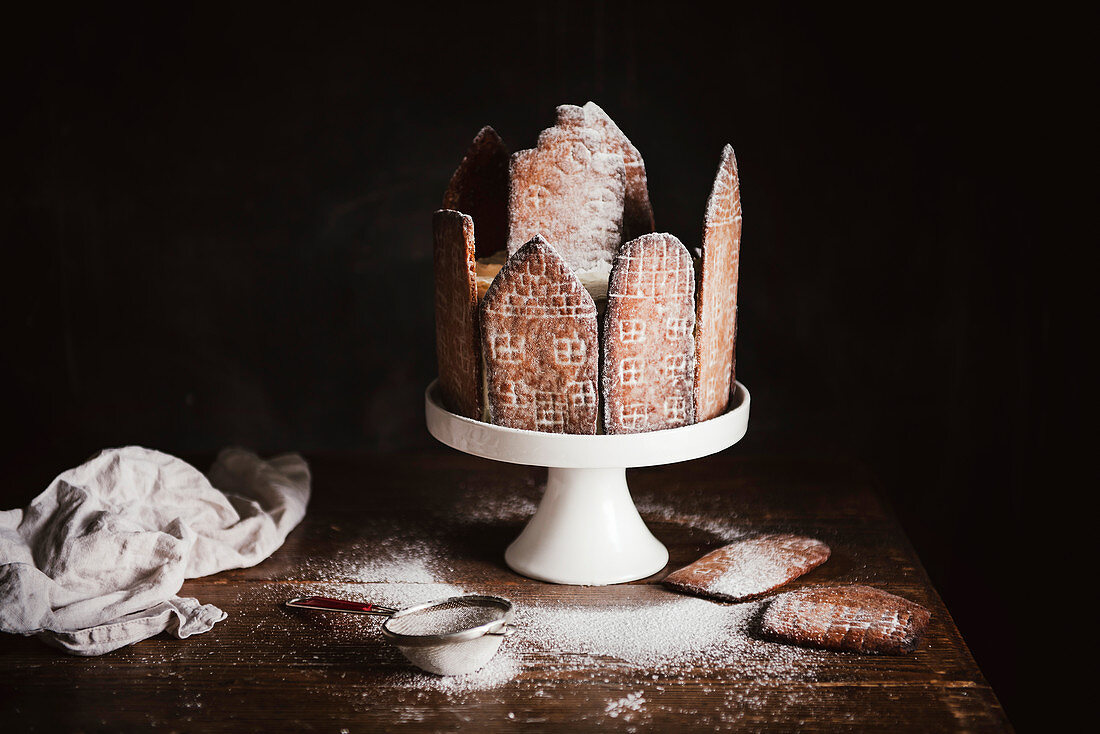 Christmas cake decorated with gingerbread houses