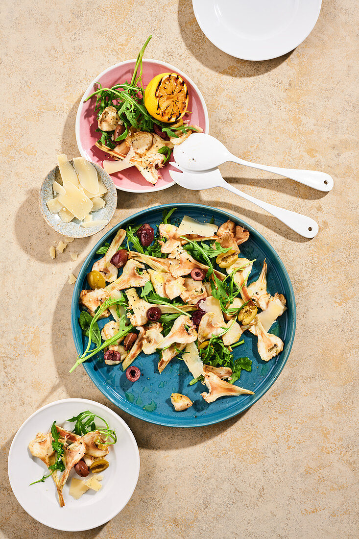 Artichoke carpaccio with Parmesan, rocket and olives