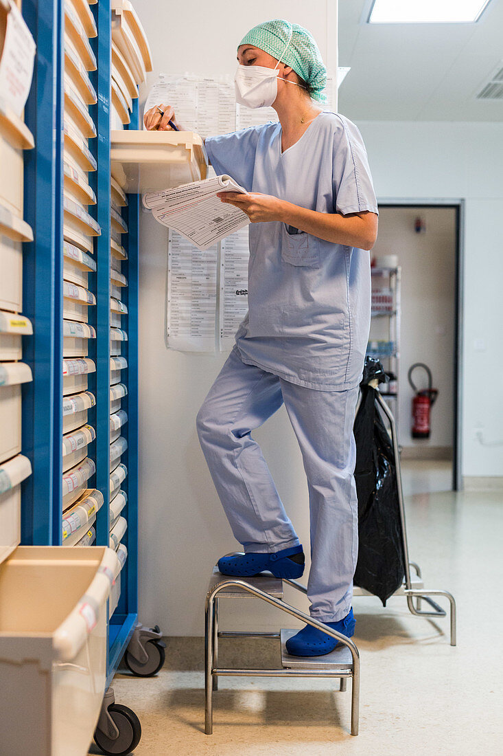 Nurse in the pharmacy of a surgery unit