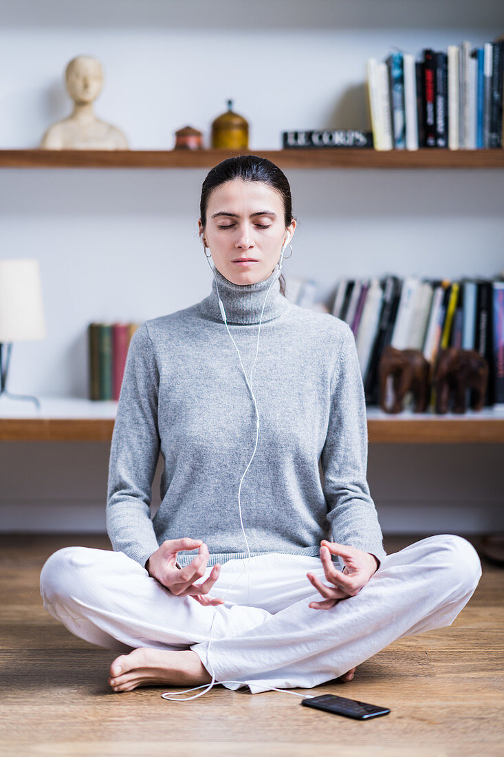 Woman relaxing listening to music