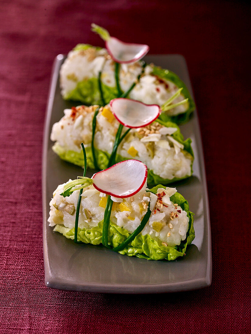 'Sushi' rolls with goat’s cheese in a lettuce leaf
