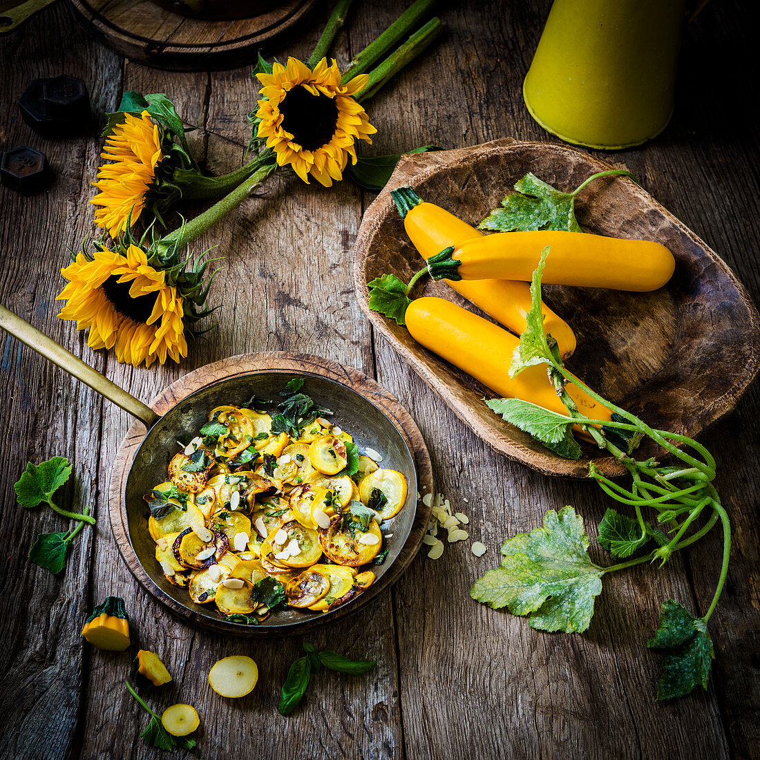 Pan fried courgettes with herbs and sliced almonds with sunflowers