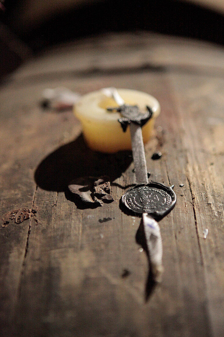 A wax seal on a wooden wine barrel, Madeira, Portugal