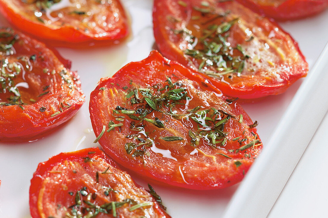 Oven-roasted tomatoes with honey and herbs