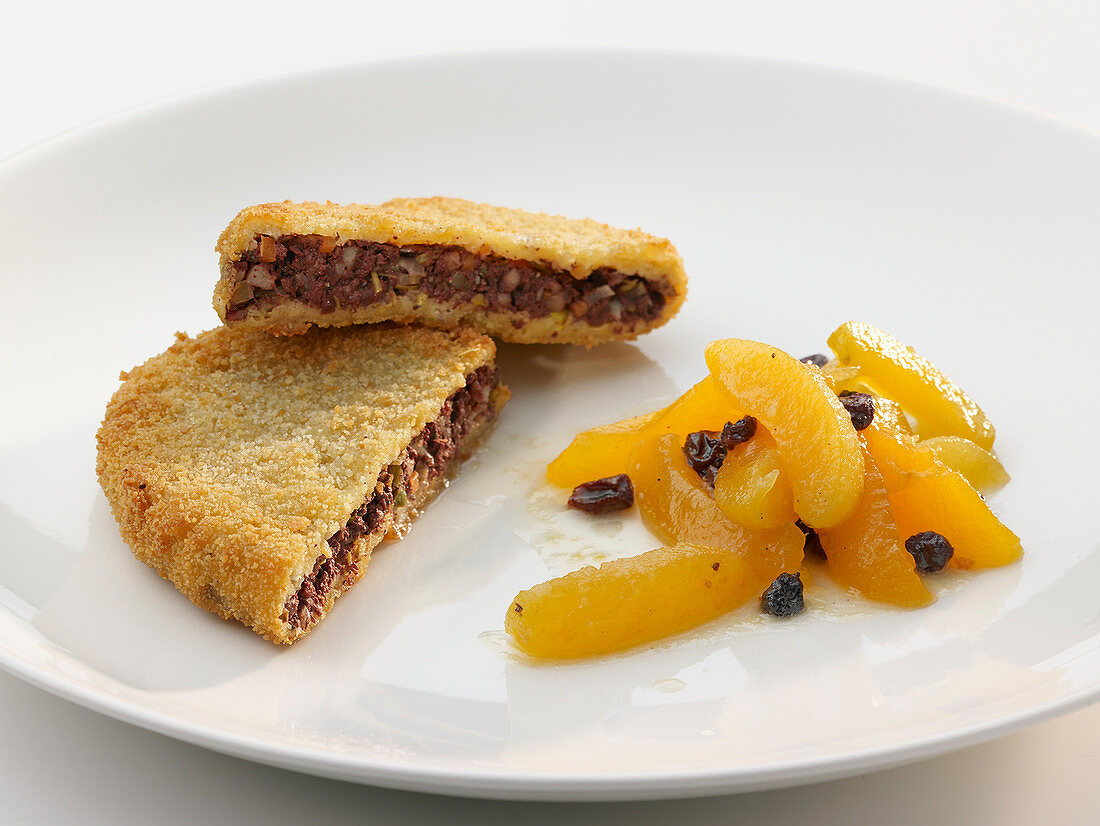 Breaded black pudding with apricot compote