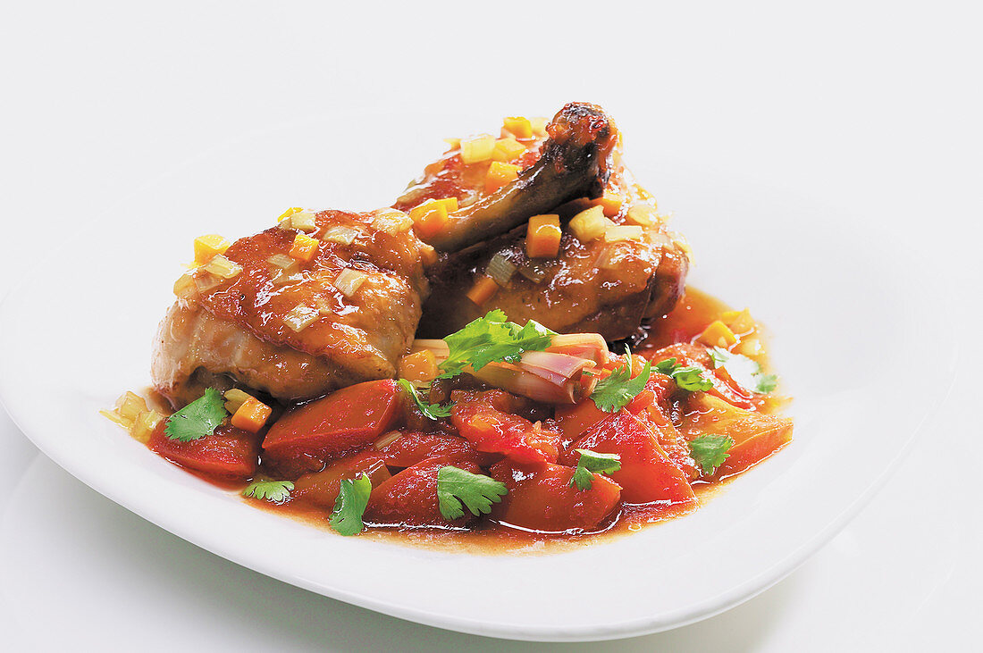 Stir-fried chicken with tomatoes