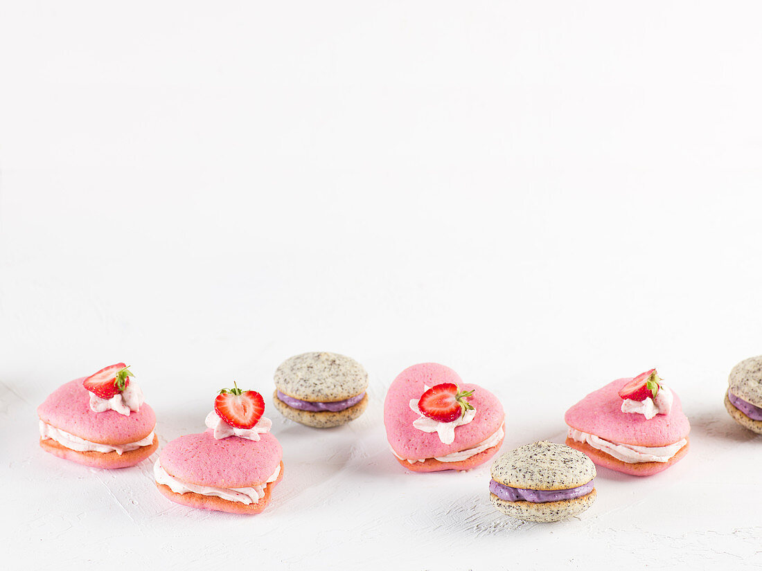 blueberry and poppyseed whoppie pies and pink heart-shaped whoopie pies