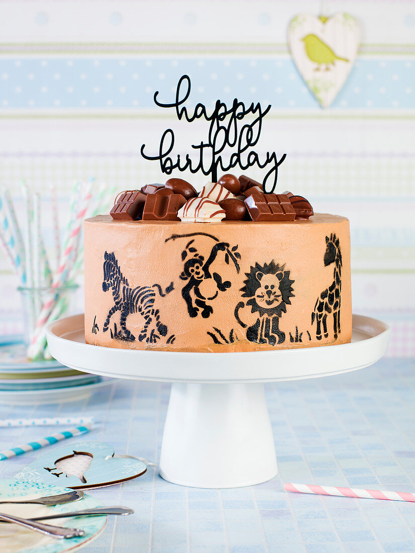 A children's birthday cake decorated with animals