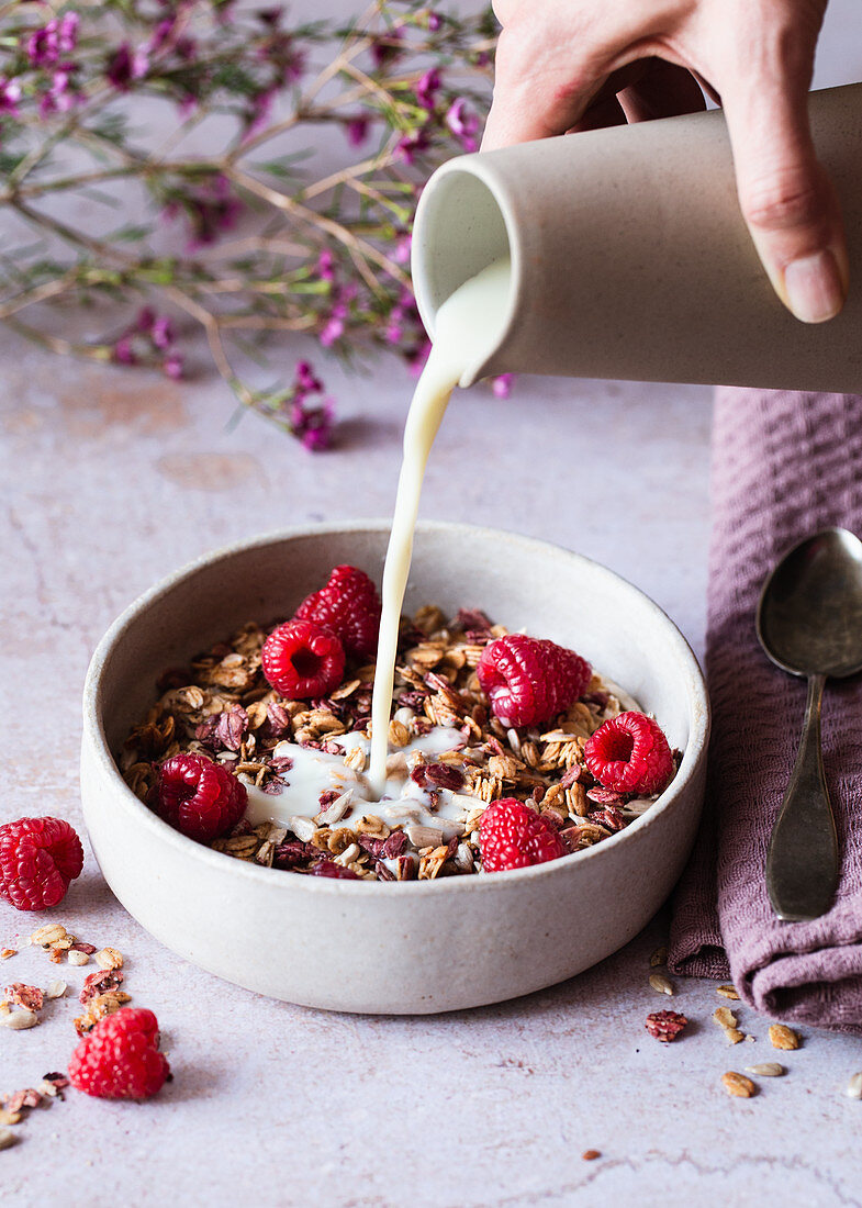 Granola with raspberries and soy drink