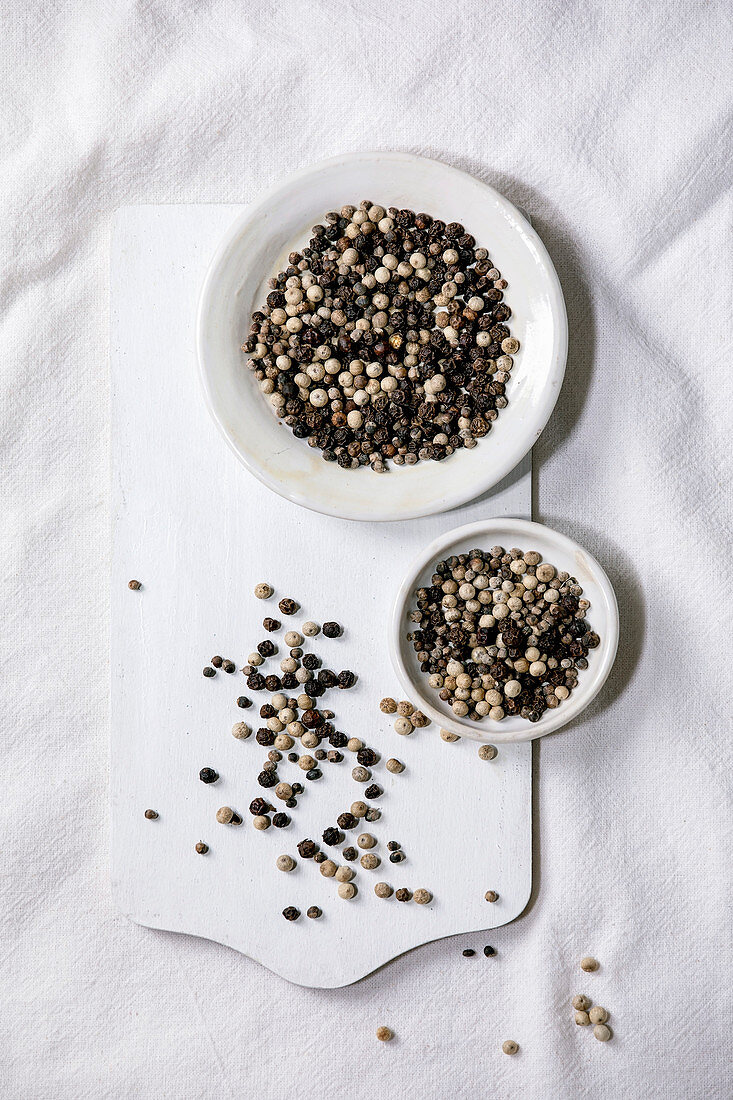 Mix of black and white peppercorns