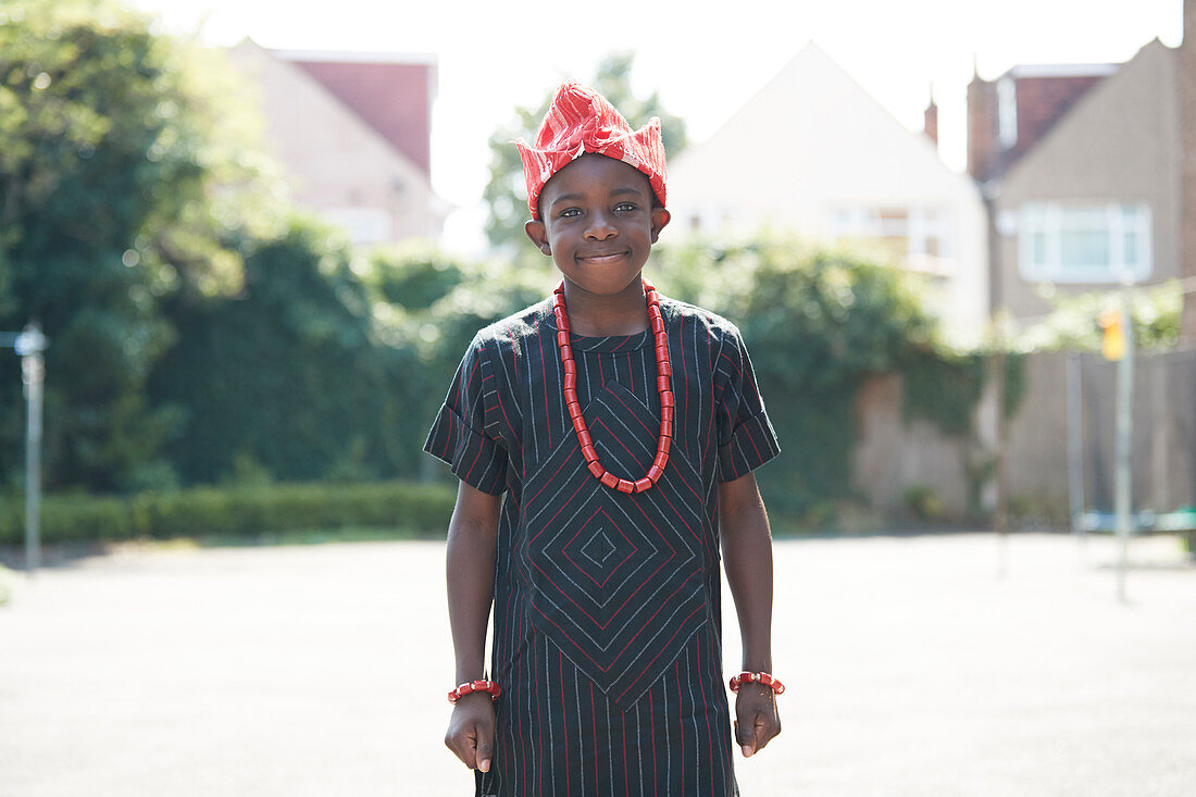 Portrait confident boy in traditional African clothing