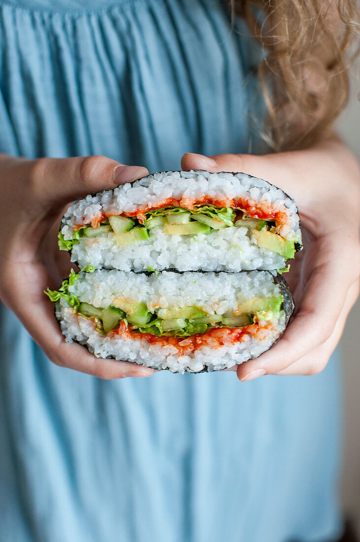 Vegan Onigirazu with gochujang paste, lettuce, avocado and cucumber