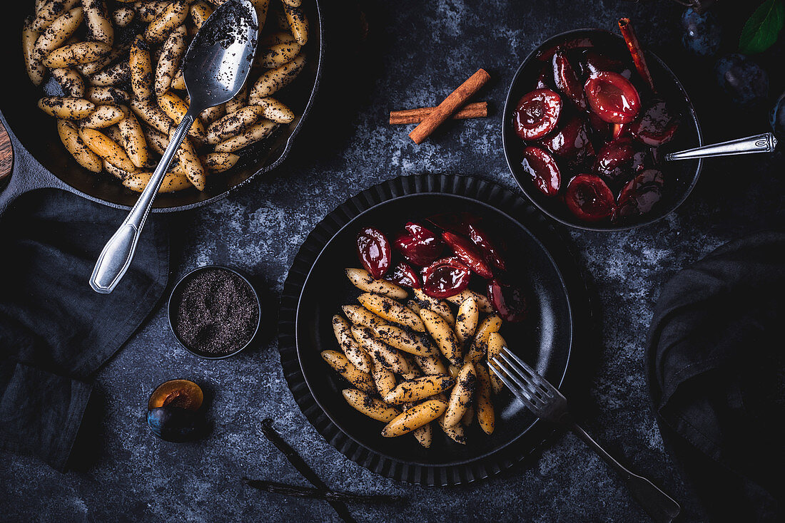 Sweet Schupfnudeln with poppy seed butter and stewed plums