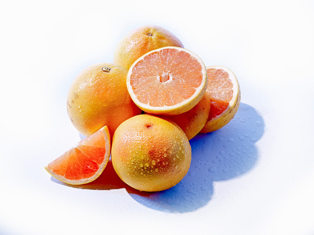 Pink grapefruit with water drops