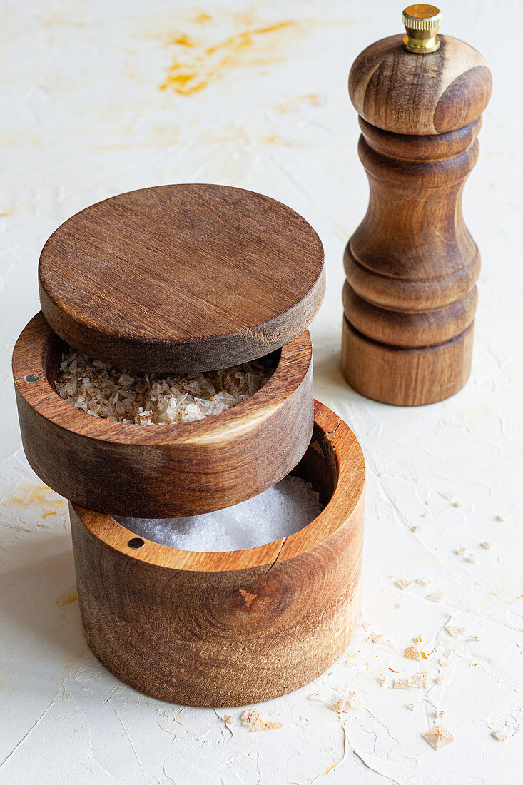 Various types of salt in wooden jars