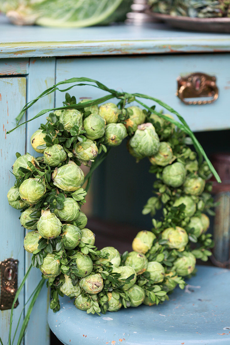 Autumn wreath of Brussels sprouts and boxwood