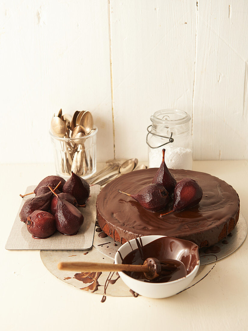 Chocolate spice cake with poached red wine pears