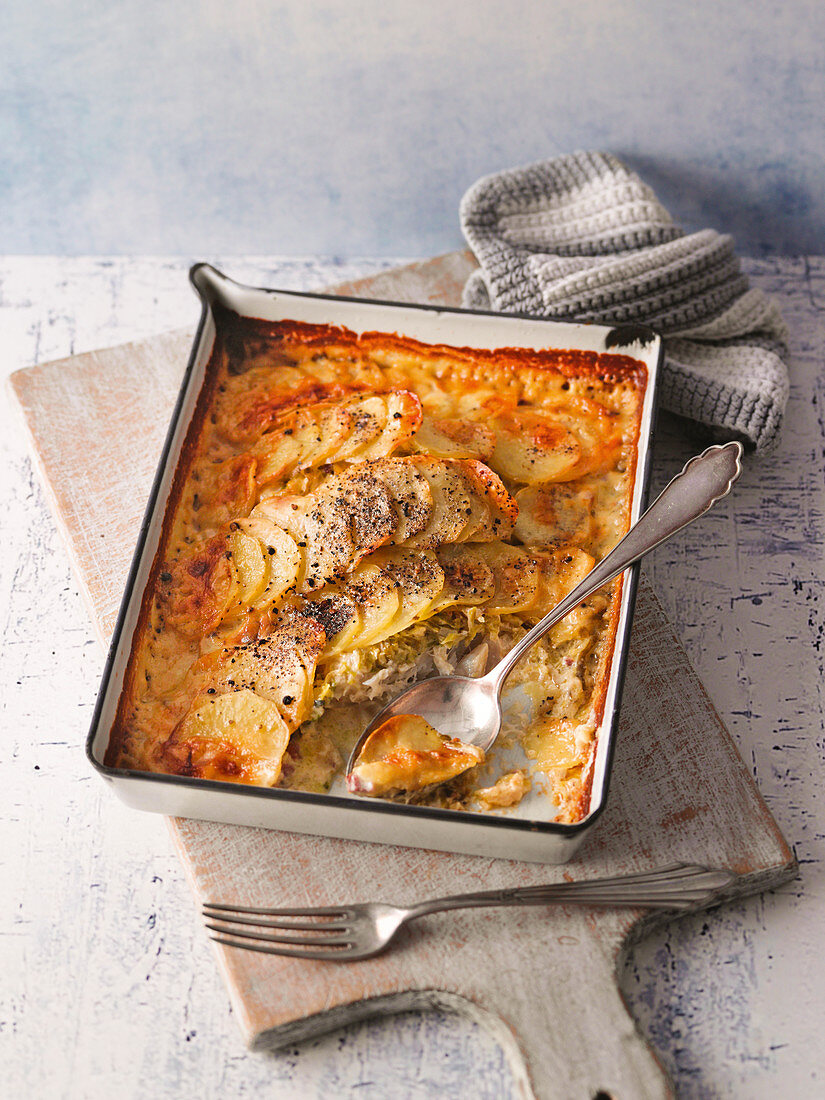Brussel sprouts and fish casserole with potato topping