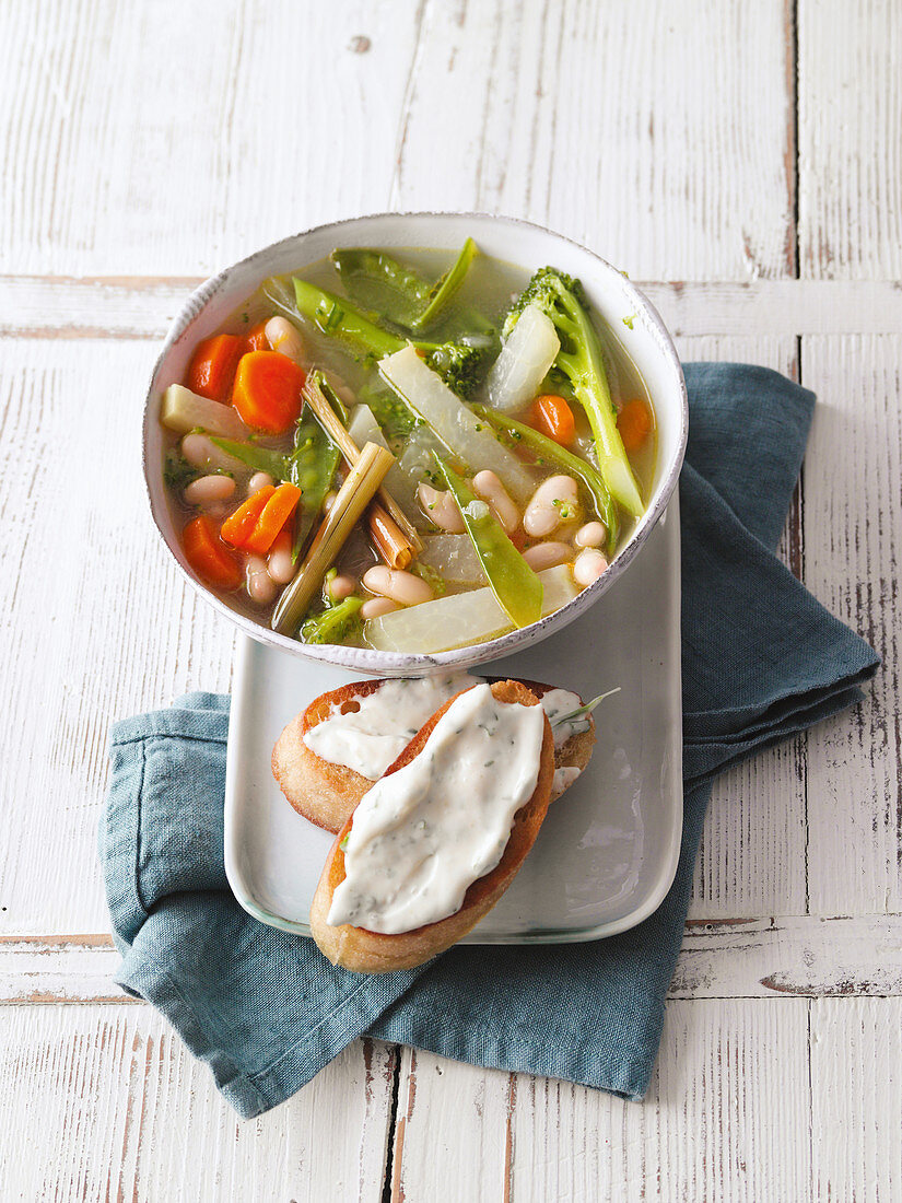 Vegan garden vegetable stew with herb aioli