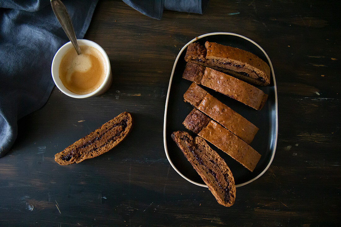 Biscotti with jam filling served with coffee