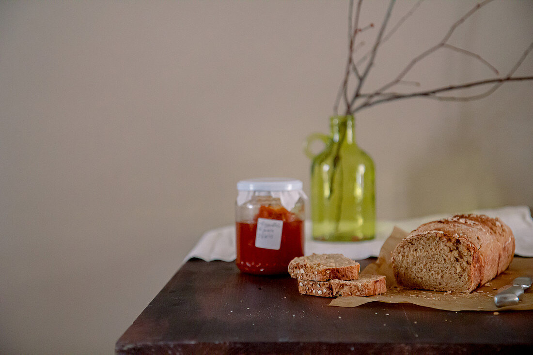 Oat and spelt bread on a rustic wooden table