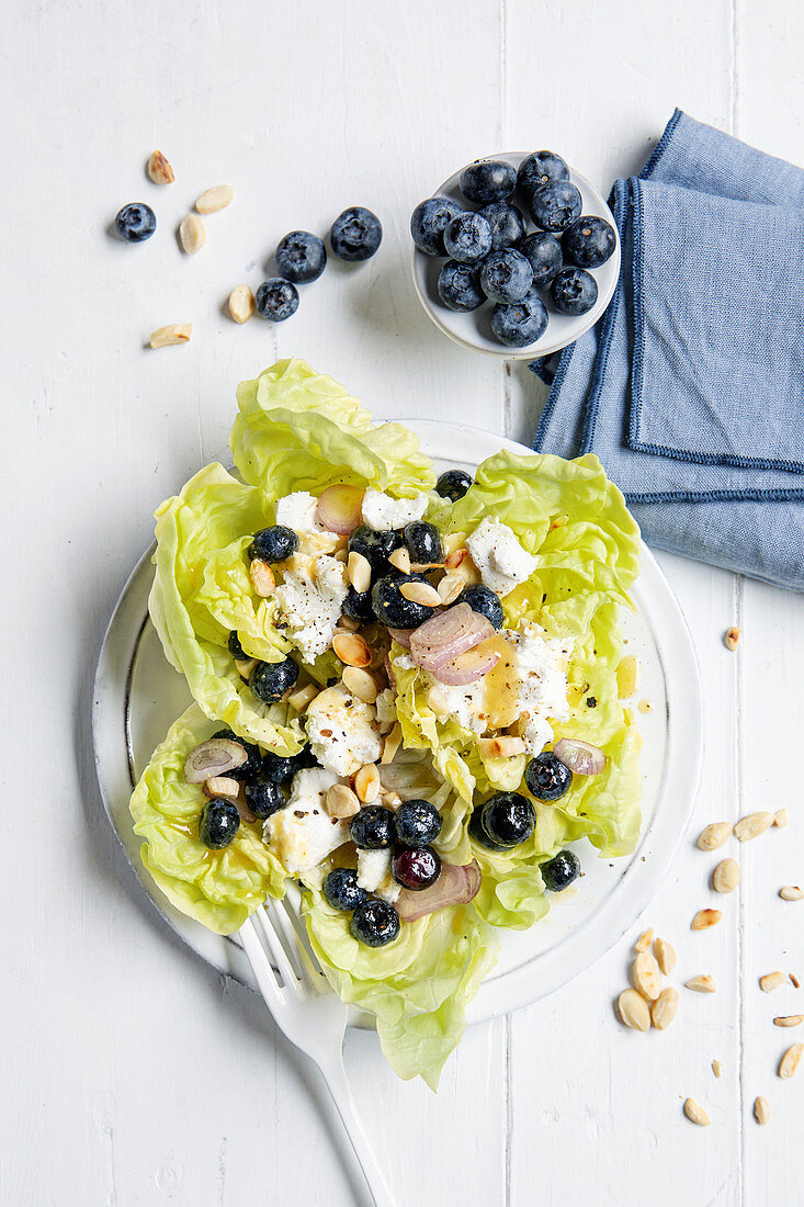 Summer salad with blueberries, fresh goat’s cheese and almonds