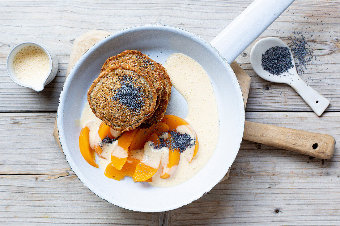 Poppy seed pancakes with apricot sauce