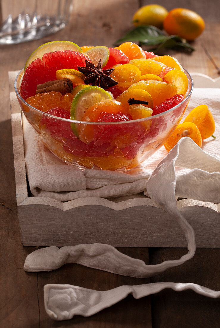 Mixed citrus fruit salad with honey and star anise