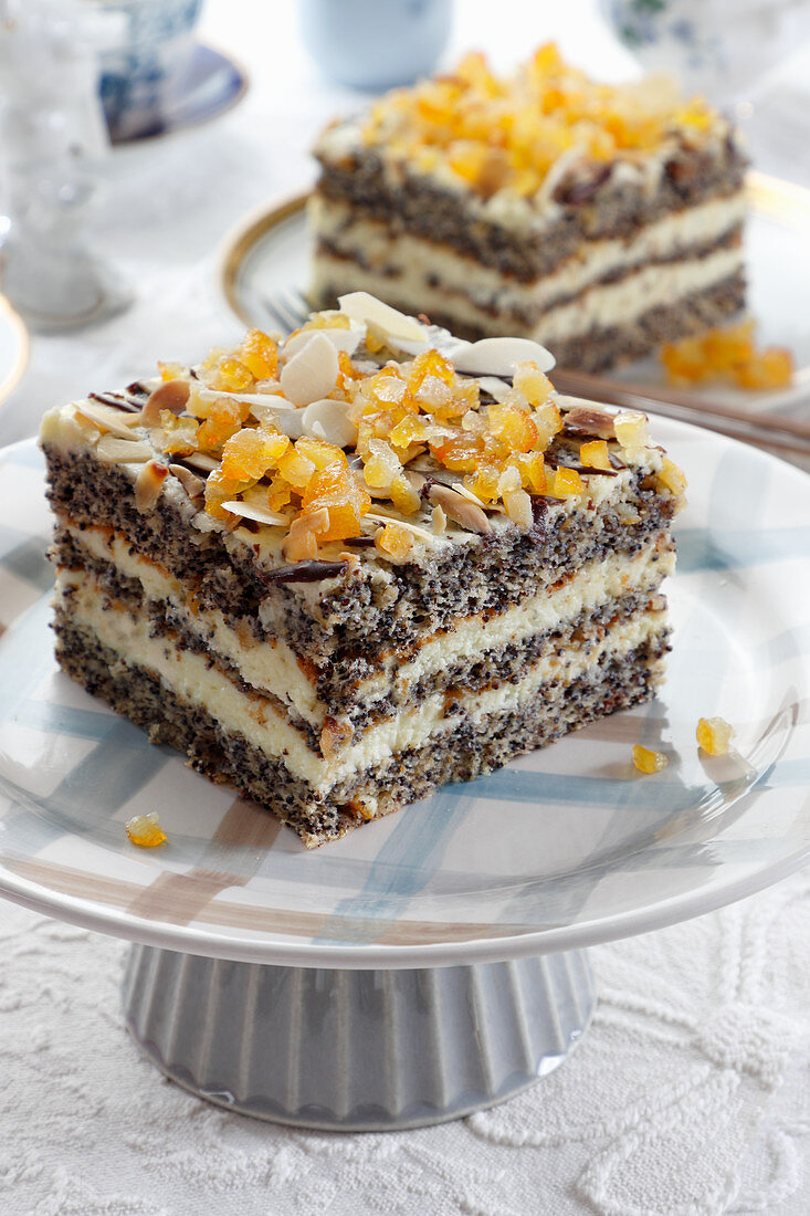 Poppy seed cake layer with orange and almond flakes