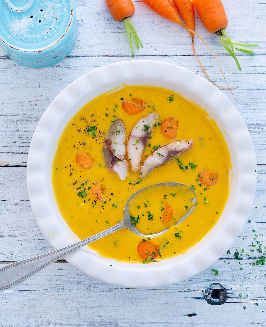 Carrot soup with mackerel fillets