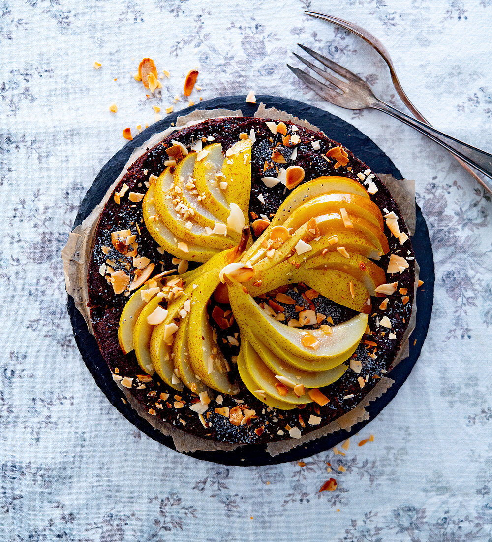 Vegan poppy seed pear cake with nuts