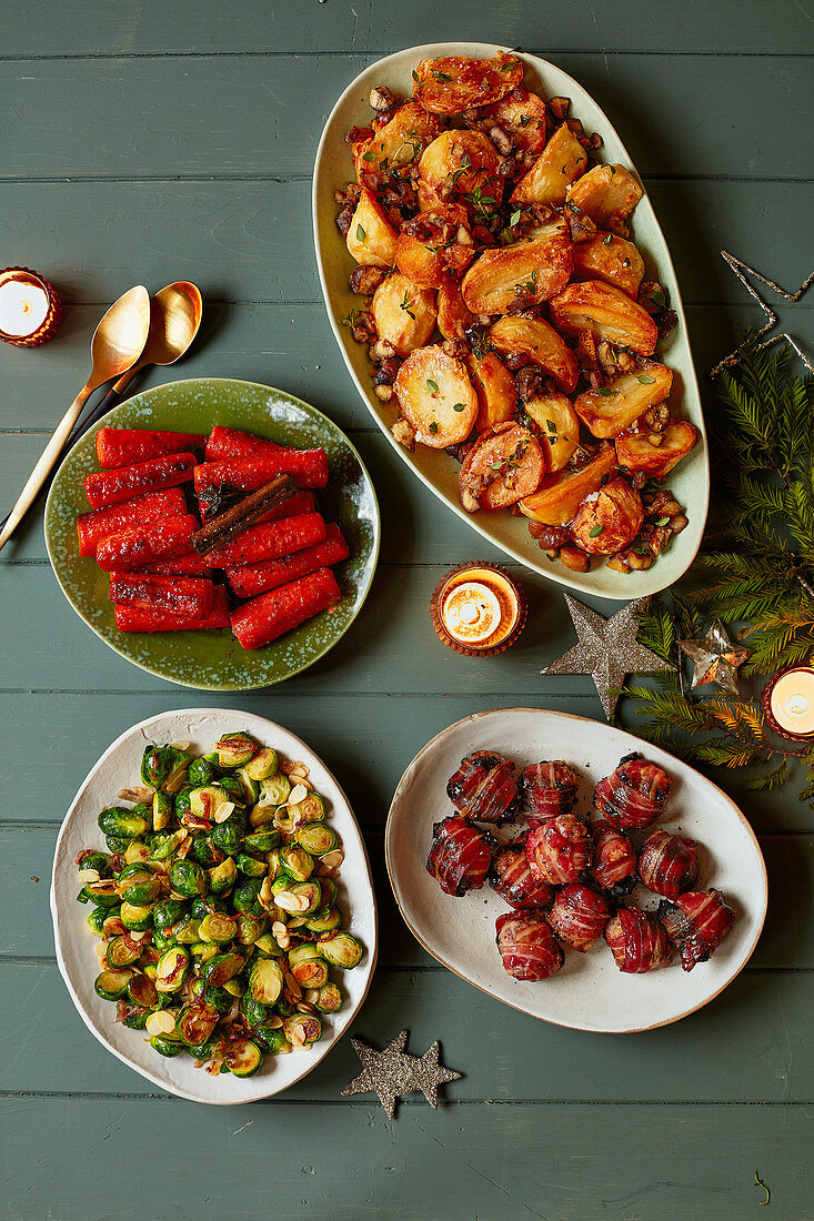 Christmas sides - Bacon and prune packages, Roast potatoes, Sprouts with almons, Cider carrots