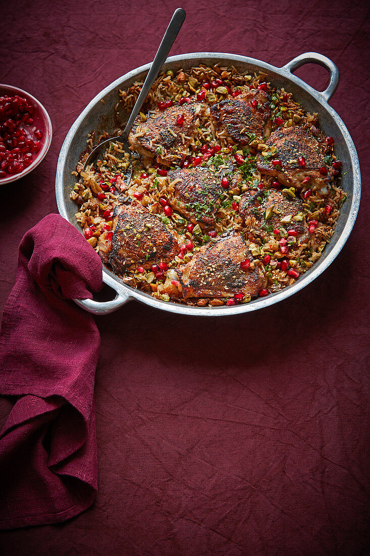 Crispy za'atar chicken pilaf with pomegranate