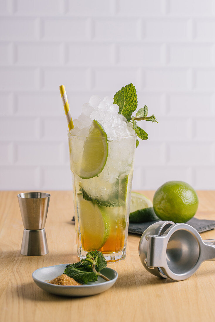 Mojito cocktail with ice and mint leaves