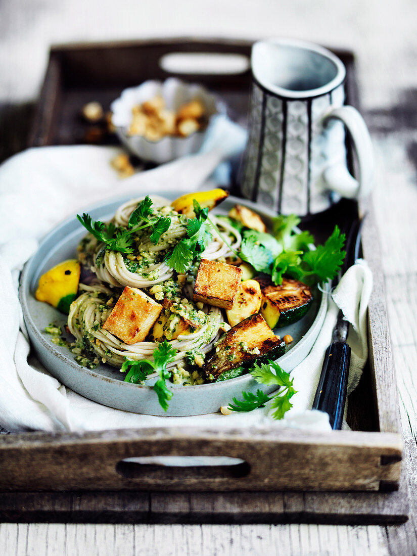 Zucchini and tofu noddles with coriander pesto