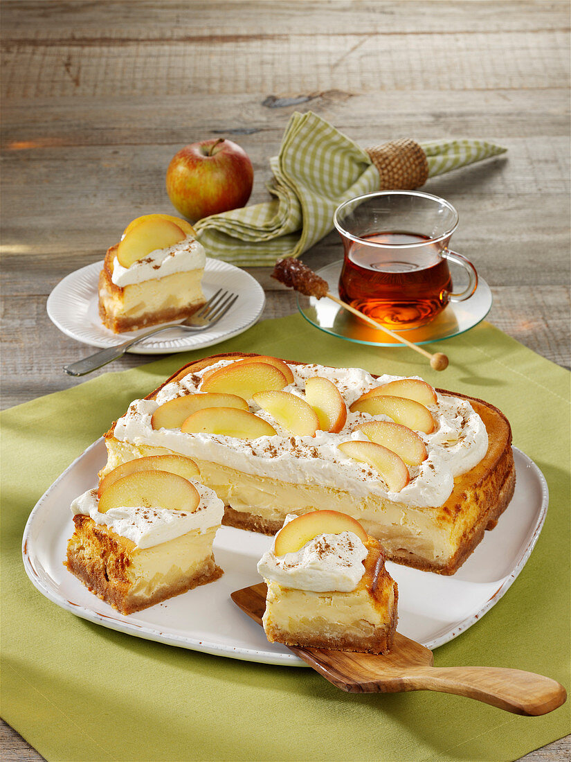 Cheesecake with apple and whipped cream