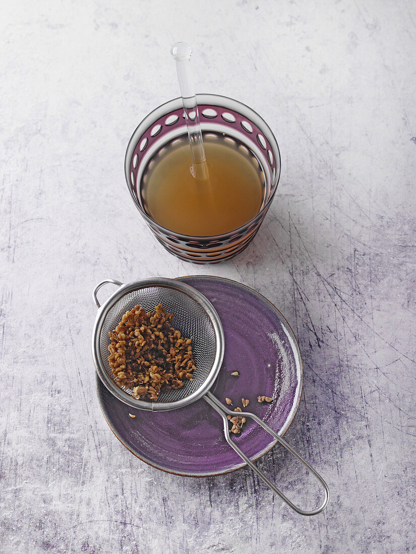 A drink made from medicinal clay, caraway seeds and apple cider vinegar