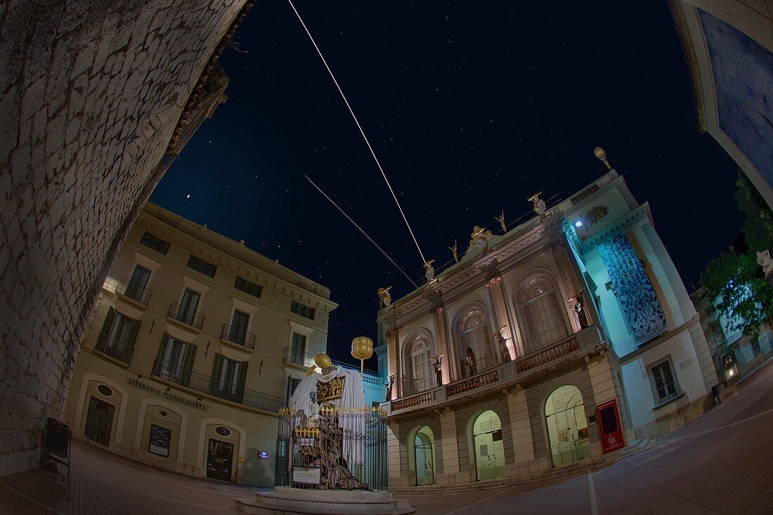 ISS and SpaceX Dragon 2 trail over Dali Museum, Spain