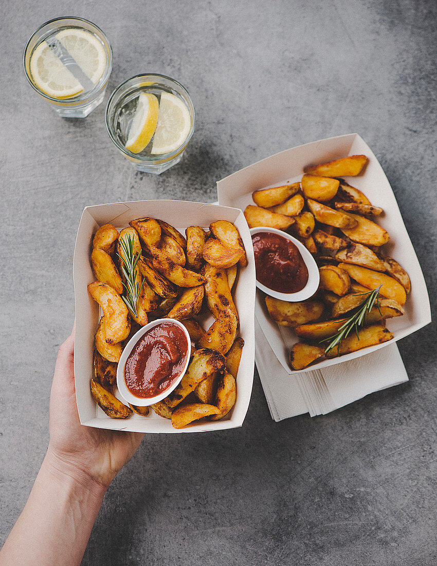 Fried potato wedges with barbecue sauce