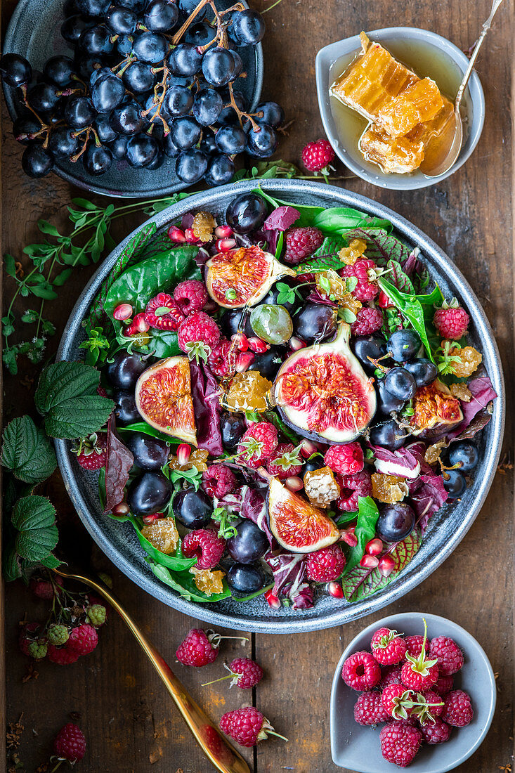 Raspberry and fig salad with grapes and honeycomb