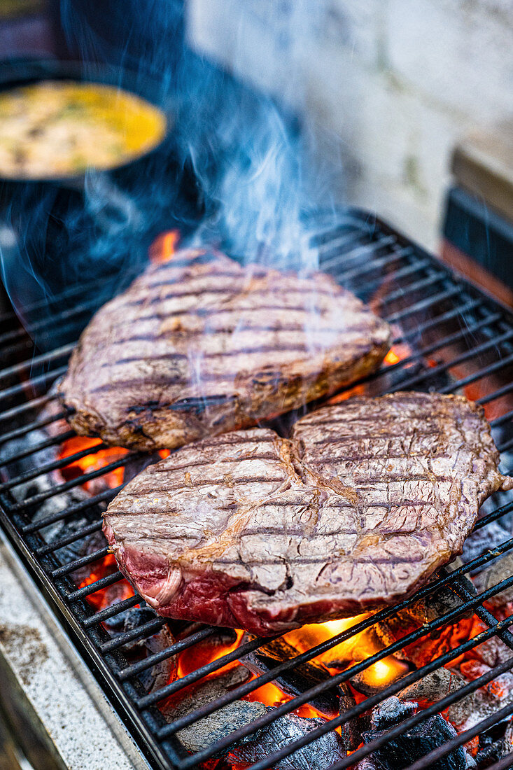 Beef steaks on a grill
