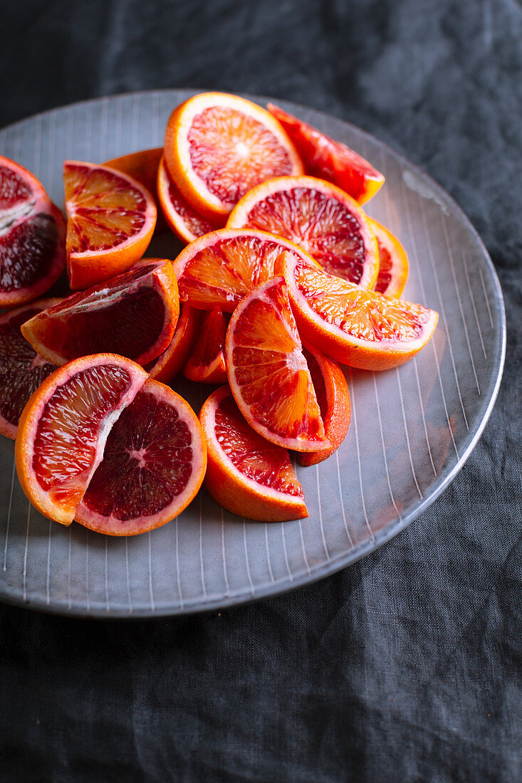 Blood oranges sliced on a plate
