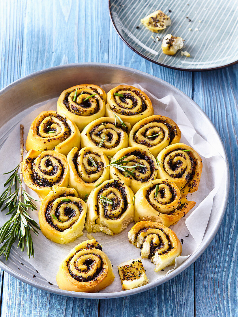 Dough rolls with tapenade and rosemary