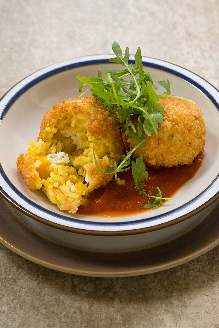 Butternut and feta arancini with tomato sauce and rocket