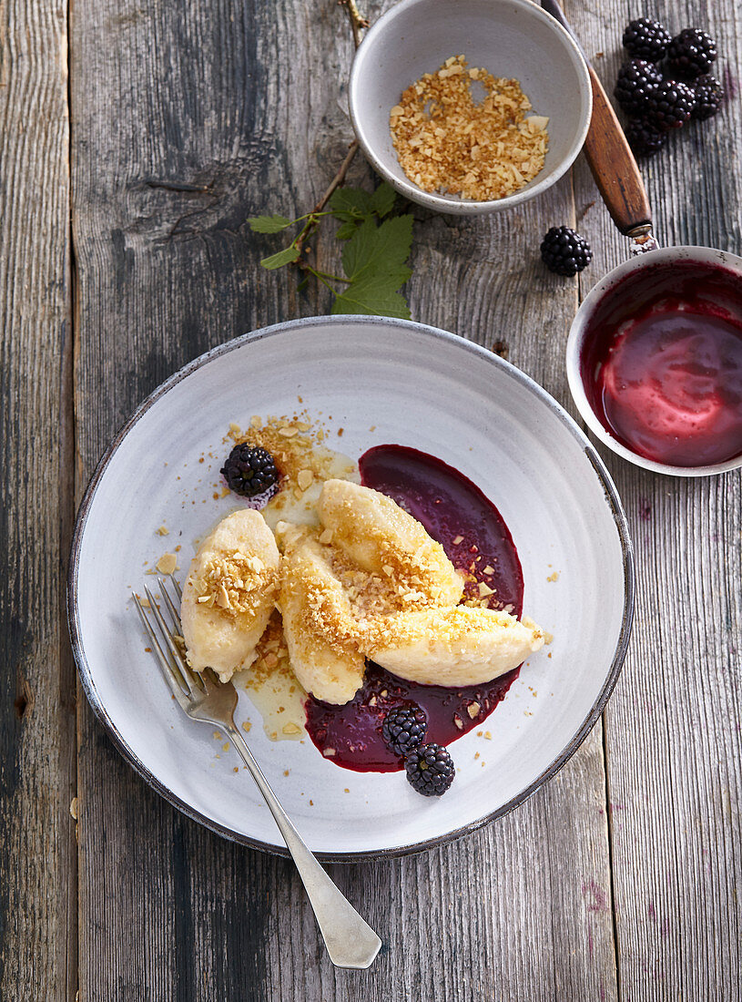 Custard gnocchi with blackberries