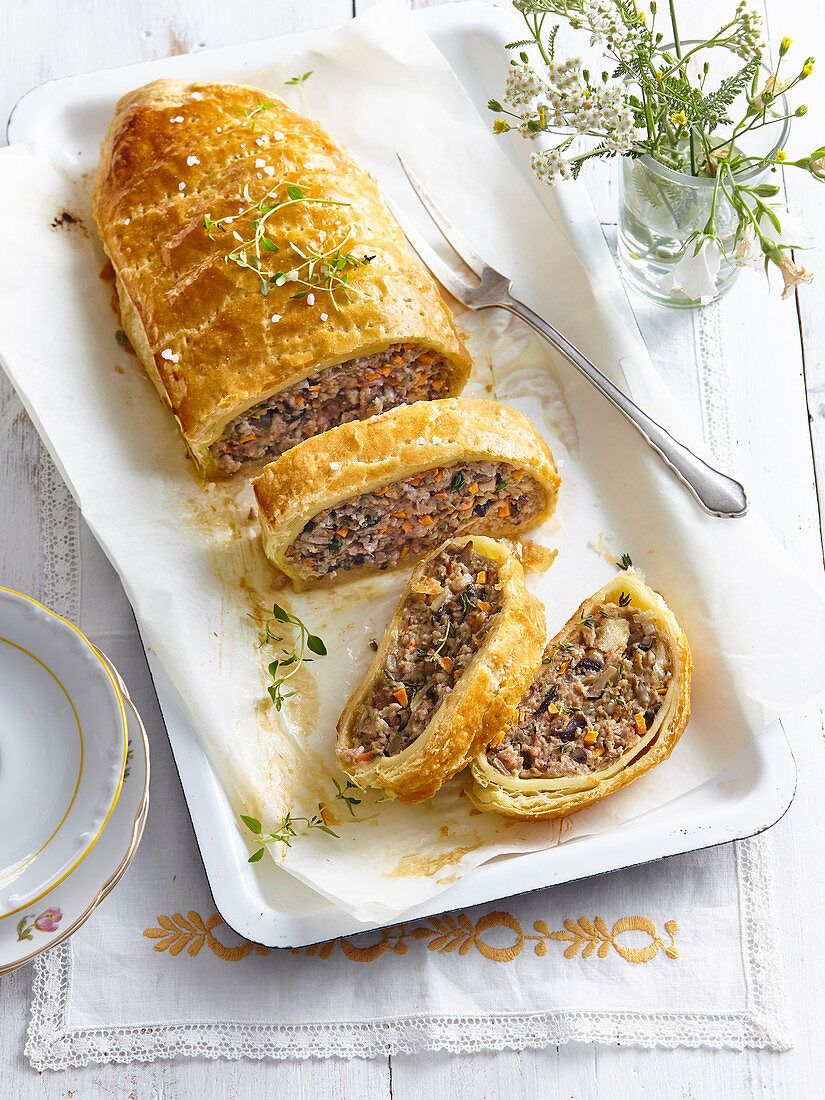 Meatloaf with mushrooms in puff pastry